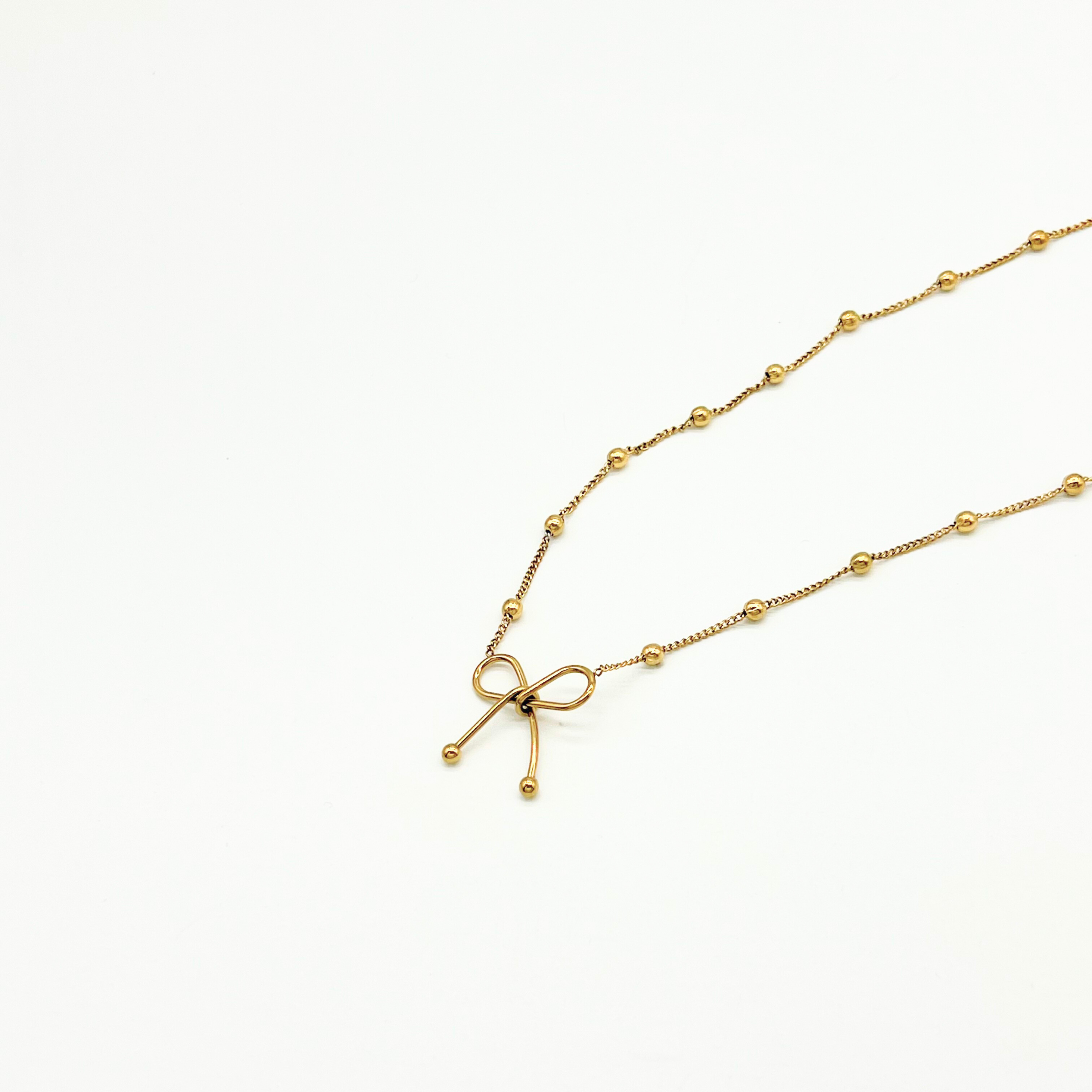 Minimalist Gold Beaded Chain Necklace with Bow Charm