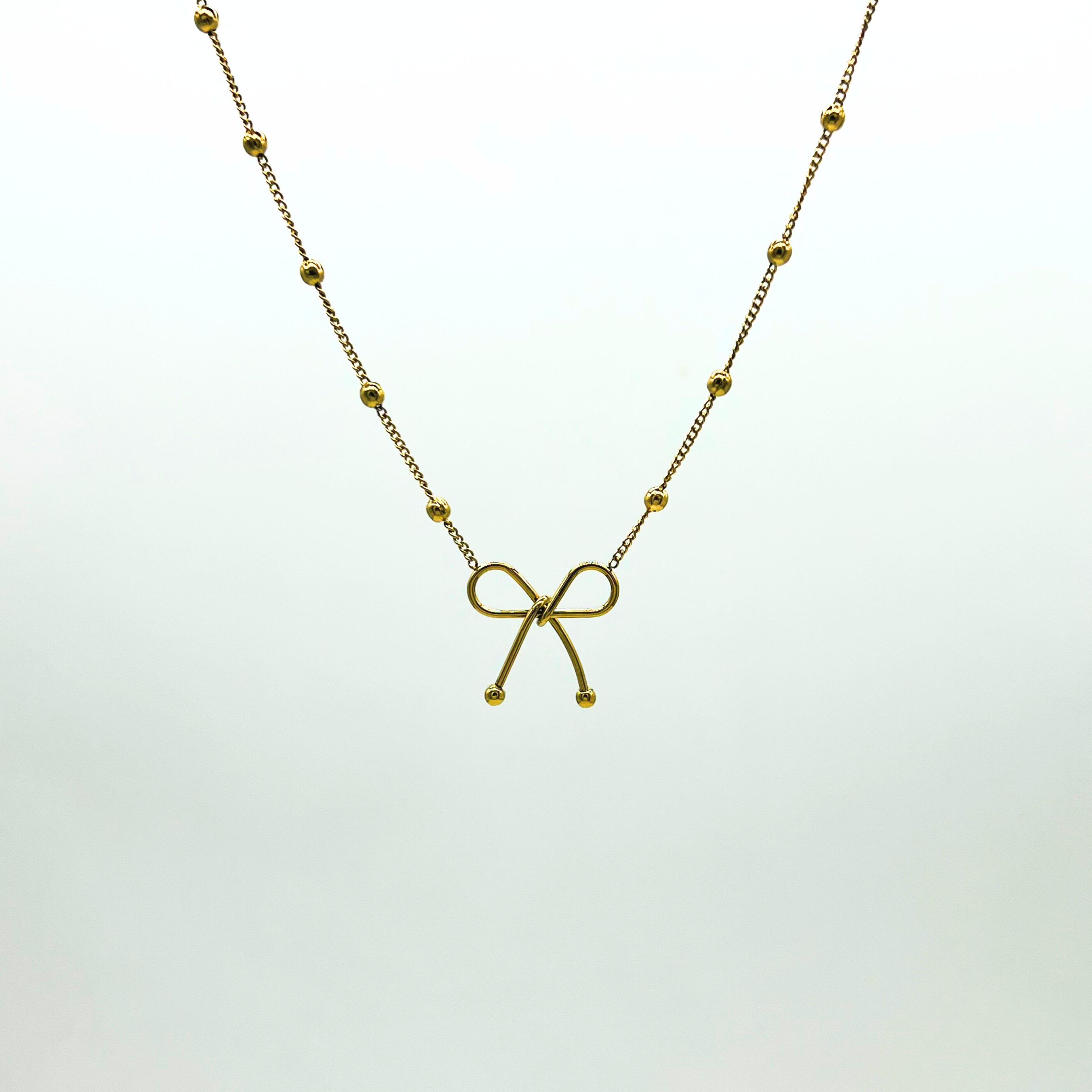 Minimalist Gold Beaded Chain Necklace with Bow Charm
